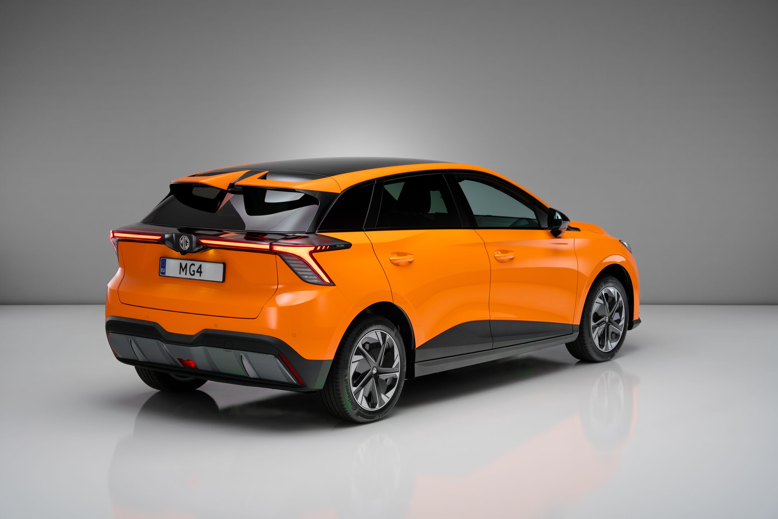 MG4 Electric, 3/4 rear, press images, studio, Automobile, Car, Machine, Sedan, Tire, Transportation, Vehicle, Wheel